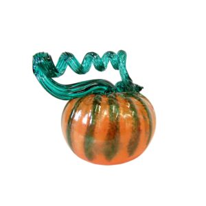 Glass pumpkin with orange and green stripes and a curly green stem on a white background.